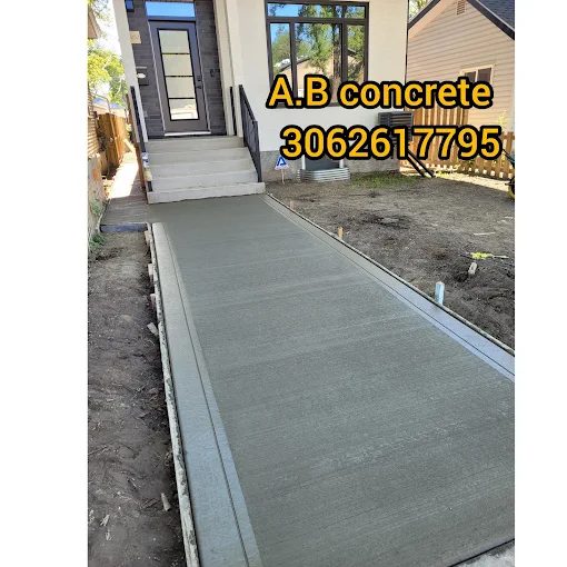 Long broom-finish concrete walkway from sidewalk to front entry